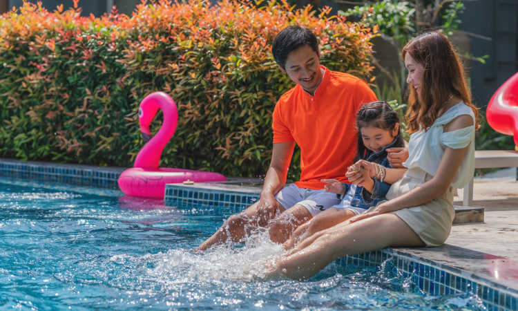 Family by the pool