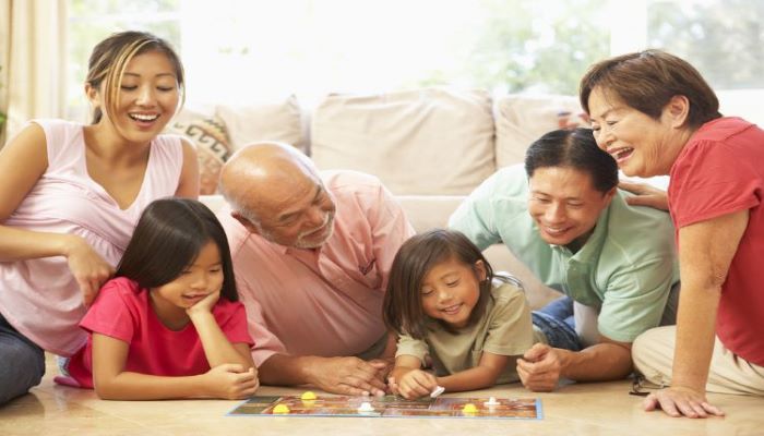 Family playing board games